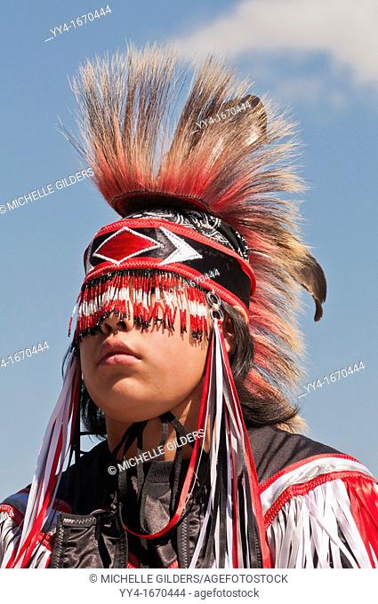 Young Blackfoot boy in traditional regalia, Siksika Nation Pow-wow, Gleichen, Alberta, Canada