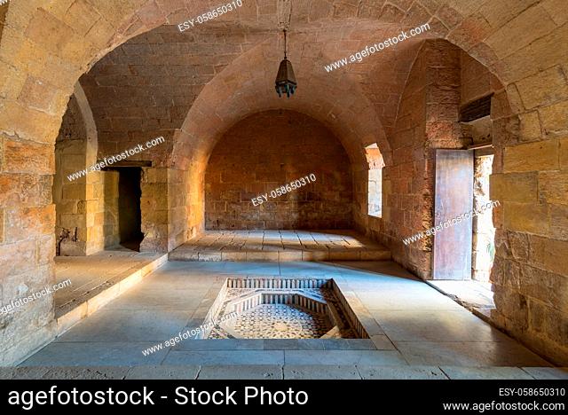 Hall at Mamluk era historic Prince Taz palace with vaulted stone bricks ceiling and marble fountain situated on the intersection of Saliba Street and Suyufiyya...
