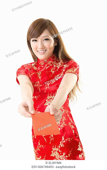 Attractive Chinese woman dress traditional cheongsam and hold red envelope, closeup portrait on white background