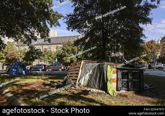 A tent and a structure of mixed materials form a small homeless encampment can be seen on Virginia Ave. NW across from the Watergate Hotel in the Foggy Bottom...