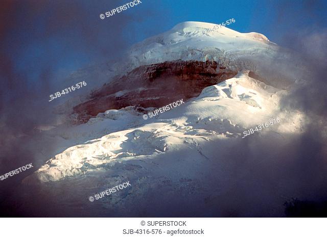 Breaking Clouds Reveal Cotopaxi's Jumbled, Heavily Glaciated Summit