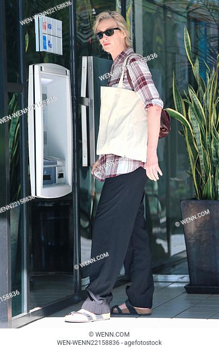 Jane Lynch drops her bank card as she withdraws cash from an ATM while out and about in Los Angeles Featuring: Jane Lynch Where: Los Angeles, California