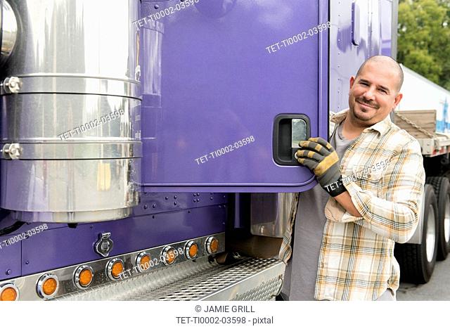 Truck driver and purple semi-truck