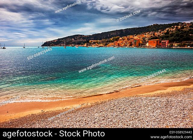 Beach and sea bay in Villefranche-sur-Mer resort on French Riviera in France