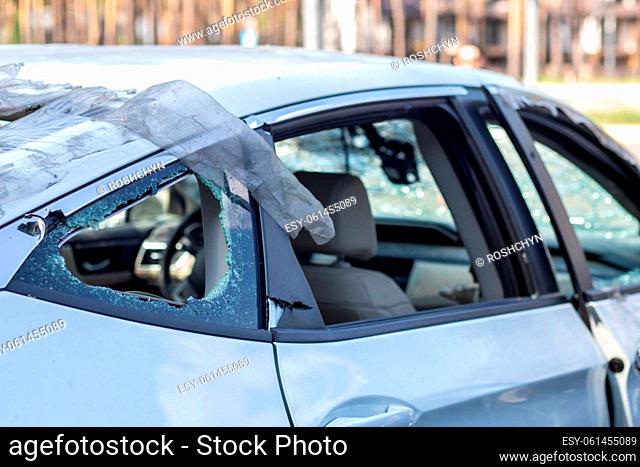 Traffic accident on the street, damaged car after a collision in the city. Accident due to speeding and alcohol intoxication. Transport background