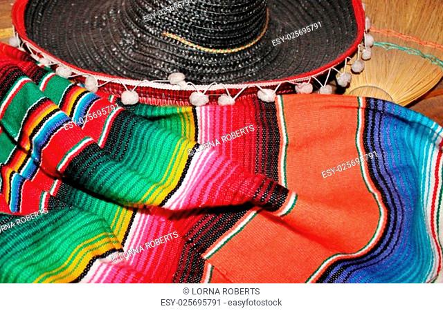 Mexican sombrero fiesta poncho serape background striped Mexico cinco de mayo fiesta