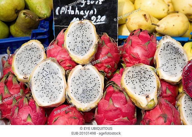 The Naschmarkt. Exotic fruit for sale on market stall. Genus Hylocereus sweet pitayas commonly known as dragon fruit