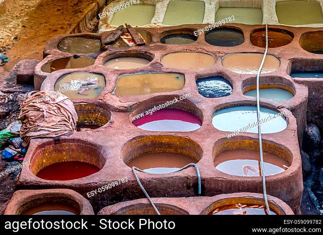 Colorful dyes in big stone vessels, Chouara Tannery, Fez, Morocco