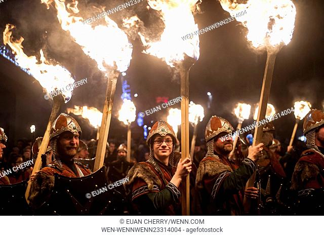 Vikings and the public attend the opening event of the Hogmanay celebrations the ""Torchlight Procession"" moves through Edinburgh to Carlton Hill
