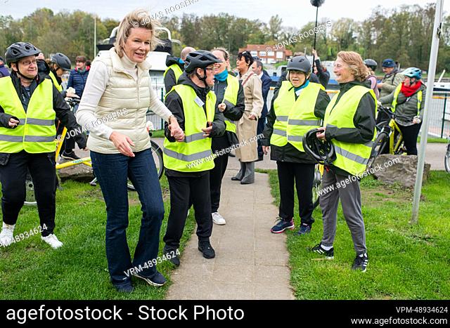 Queen Mathilde of Belgium is seen taking a coffee break during a royal visit to the province of Walloon Brabant as part of the initiative 'Together in motion...