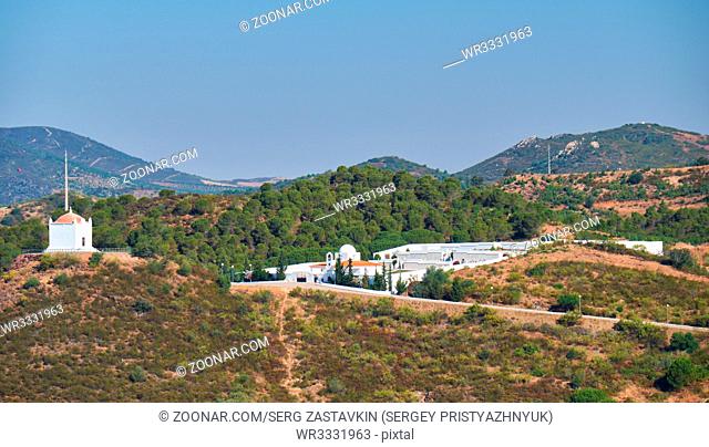 The view of Chapel of Our Lady of the Snow with its cemetery among the hills. Mertola. Portugal