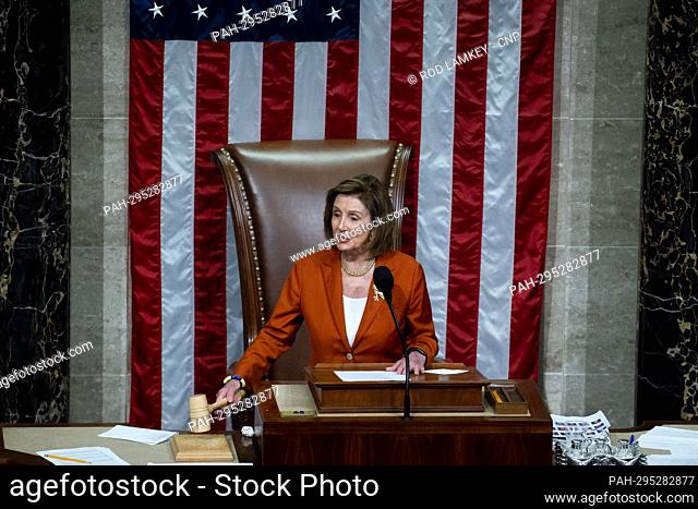 Speaker of the United States House of Representatives Nancy Pelosi (Democrat of California) hits the gavel as she presides over the House vote for the...