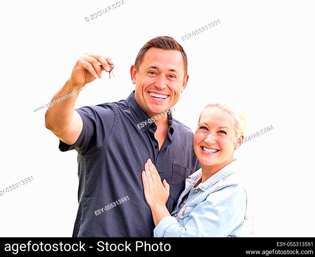 Young Adult Couple Holding New House Keys Isolated On A White Background