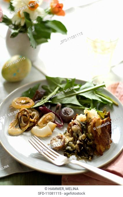 Plate on an Easter Table, Sausage Swiss Chard Strata with Roasted Onion and Dandelion Green Salad