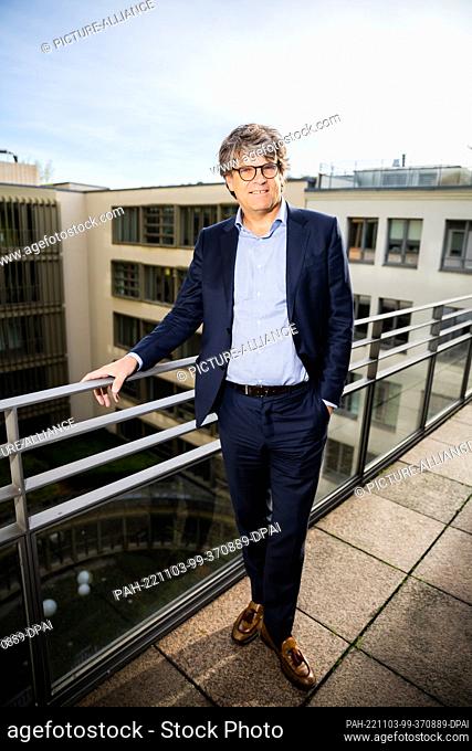 03 November 2022, Berlin: Oliver Wolff, CEO of the Association of German Transport Companies (VDV), stands on a balcony during an interview about the 49-euro...