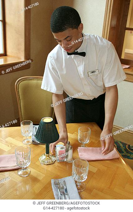 Black male waiter. Kellogg Conference Center Restaurant, Tuskegee University. Alabama. USA