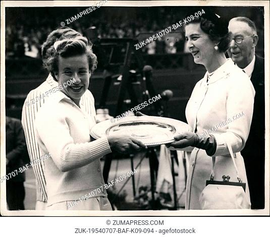Jul. 07, 1954 - 'Little Mo' wins ladies singles Title once again. Beats Louise Brough at Wimbledon. Picture Shows: 'Little No' Maureen Connolly receives the...