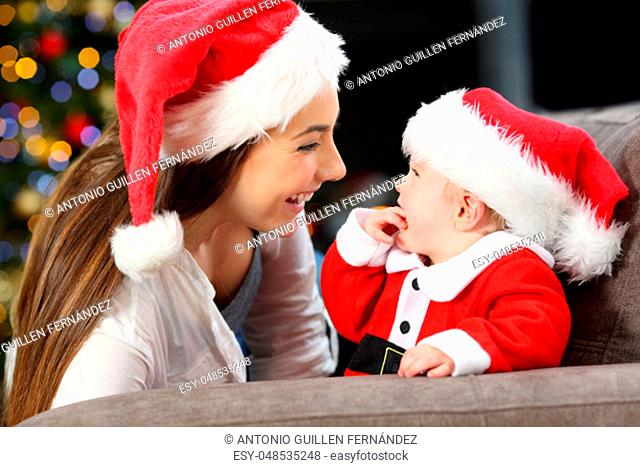 Happy mother and baby in christmas