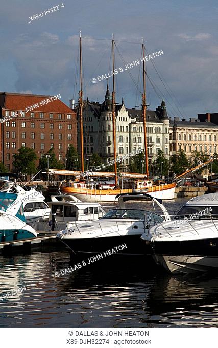 Finland, Helsinki, Helsingfors, North Harbour, Waterfront Buildings, Moored Motorboats at Marina