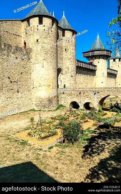 The historical fortress Carcassonne with bridge, towers and fortifications in the south of France