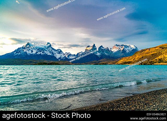 View of Cuernos del Paine mountains and Pehoe Lake in the evening at Torres del Paine National Park, Chile