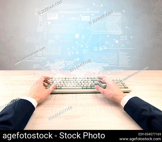 Elegant businessman hand typing with financial, report, graph, chart concept