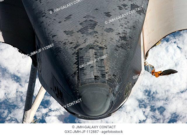 This view of the nose and the forward underside of the space shuttle Endeavour was provided by an Expedition 27 crew member during a survey of the approaching...