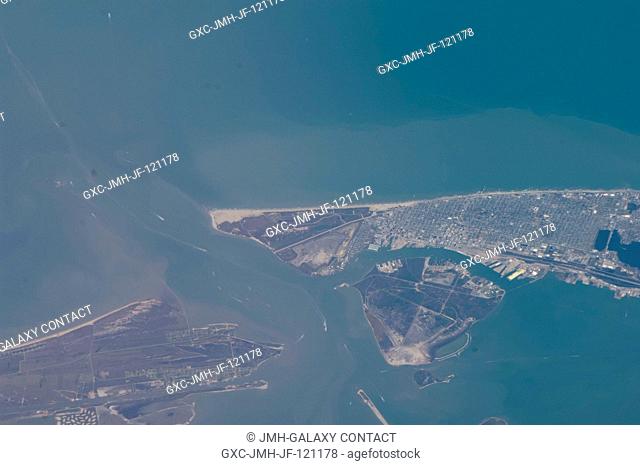 One of the Expedition 34 crew members aboard the International Space Station recorded this image of much of Galveston Island (right hand two-thirds of the...