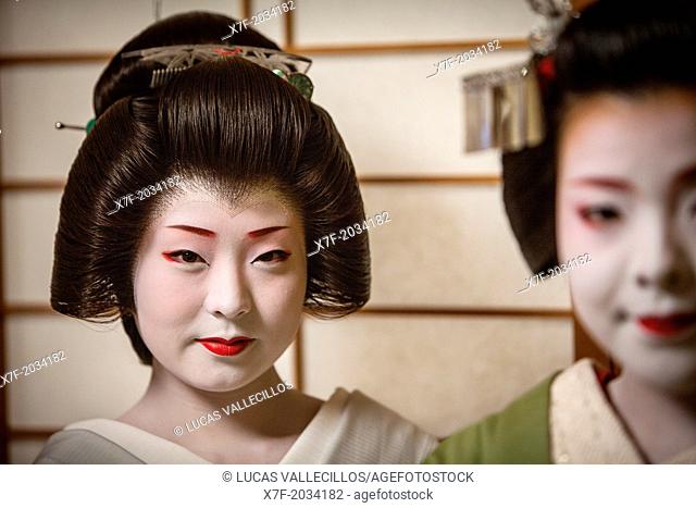 Fukuyu, geisha and Fukukimi, 'maiko' (geisha apprentice). from Ishihatsu okiya (geisha house).Geisha's distric of Miyagawacho.Kyoto. Kansai, Japan