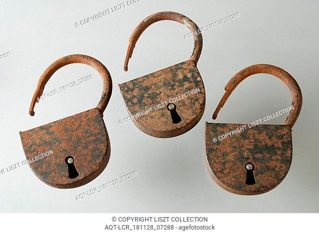 Three similar padlocks with matching keys, which belong to the storage handles of the oak coffin, padlock lock closing device key iron value iron