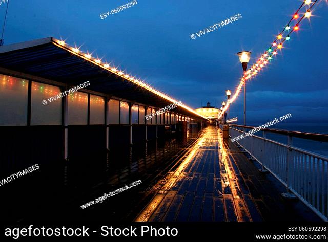 The Bournemouth pier on a cold wet night