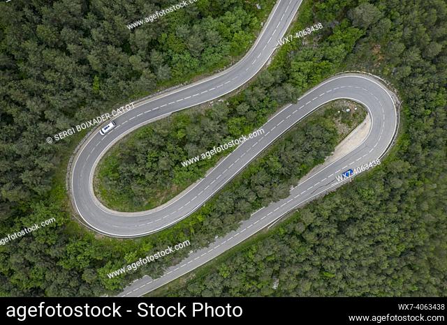 Aerial overhead view of a curvy road that goes to Saldes and Pedraforca mountain (BerguedÃ , Catalonia, Spain)