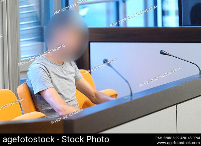 18 August 2022, North Rhine-Westphalia, Wuppertal: The defendant waits in the courtroom for the start of the trial day. In the trial of the acid attack on...