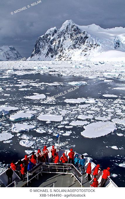 Guests from the Lindblad Expedition ship National Geographic Explorer enjoy the Lemaire Channel in Antarctica  MORE INFO Lindblad Expeditions pioneered...