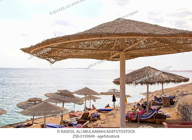 Sharm El-Shaikh, Egypt - November 2, 2018:- photo for Red Sea coast In the Egyptian city of Sharm el-Sheikh, which showing water and some rocks and beds and...