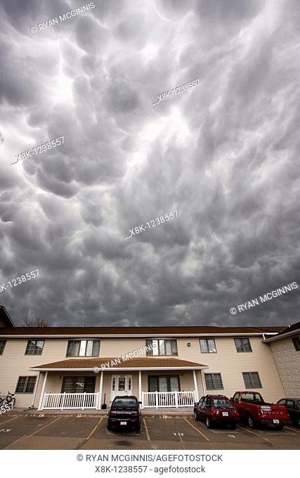 Mammatus clouds roll overhead an apartment complex in Kearney, Nebraska, June 7, 2010