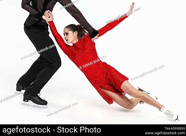 RUSSIA, CHELYABINSK - DECEMBER 21, 2023: Ice dancers Darya Savkina and Alexander Vakhnov perform their rhythm dance during the ice dance event of the 2024...