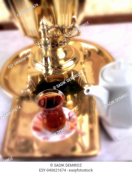close up shot of a samovar with teacup