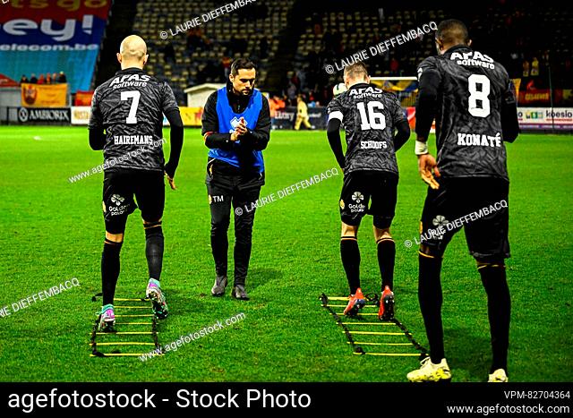 Mechelen's players pictured warming-up before the second half of a soccer match between Royale Union Saint-Gilloise and KV Mechelen