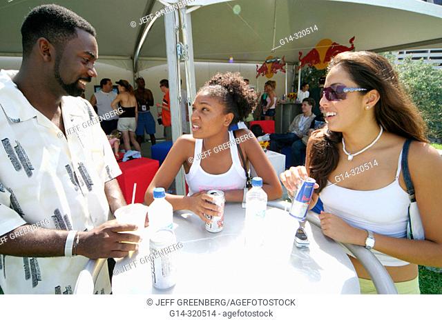 Socializing at Red Bull Flügtag festival, Bayfront Park. Miami. Florida, USA