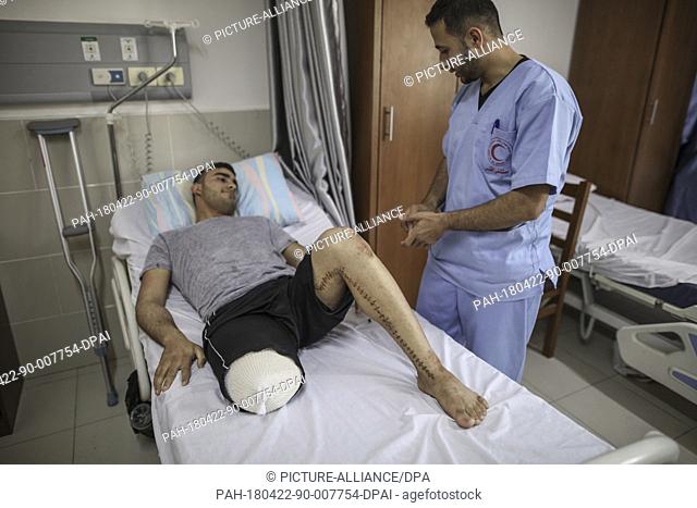 Palestinian cyclist Alaa Al-Daly, 21, who lost his leg by a bullet fired by Israeli troops during clashes along the borders between Israel and Gaza