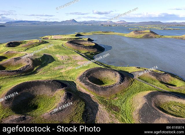 Aerial view of green volcanic crater, pseudo-crater at Lake Mývatn, Skútustaðir, Norðurland eystra, Iceland, Europe