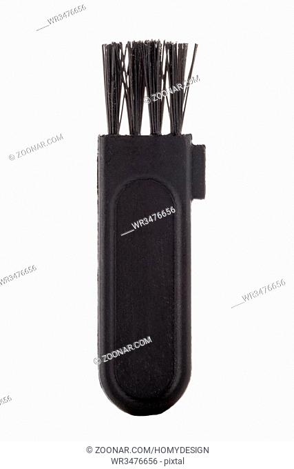Small black cleaning brush closeup isolated on white