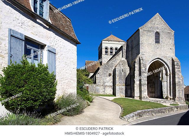 France, Seine et Marne, Saint Loup de Naud, 11th and 12th century church in roman style with a sculpted portal in early gothic style alike the royal portal of...