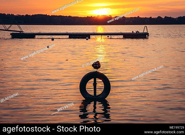 Evening over Narie Lake located in Ilawa Lakeland region, view from Kretowiny village, Ostroda County, Warmia and Mazury province of Poland