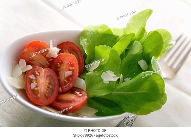 Tomato Salad with Fresh Greens and Shaved Parmesan Cheese