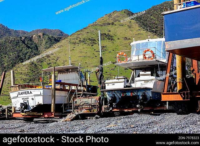 Palliser Bay, North Island, New Zealand. The fishing settlement of Ngawi has no harbour so boats are parked on trailers above high water mark when not at sea