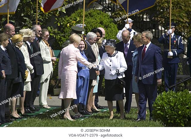 President George W. Bush and Queen Elizabeth II shaking hands of Vice President Dick Cheney, Defense Secretary Gates and Secretary of State Rice on the South...