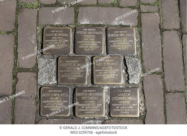 Netherlands, Gouda, 2017, Stumbling stones, or stolpersteine are memorial brass plates placed into the pavement outside certain houses or deportation zones in...