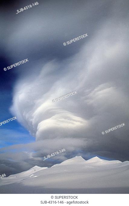 An Orographic Wave Cloud Hovers Above the Summit Complex of Mount Logan